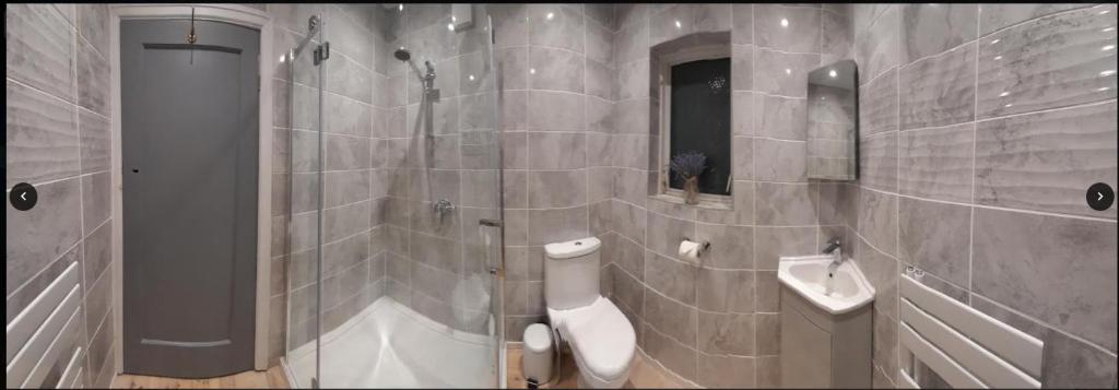 Family bathroom with a large shower